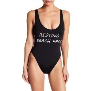 The Bikini Lab Resting Beach Face Swimsuit